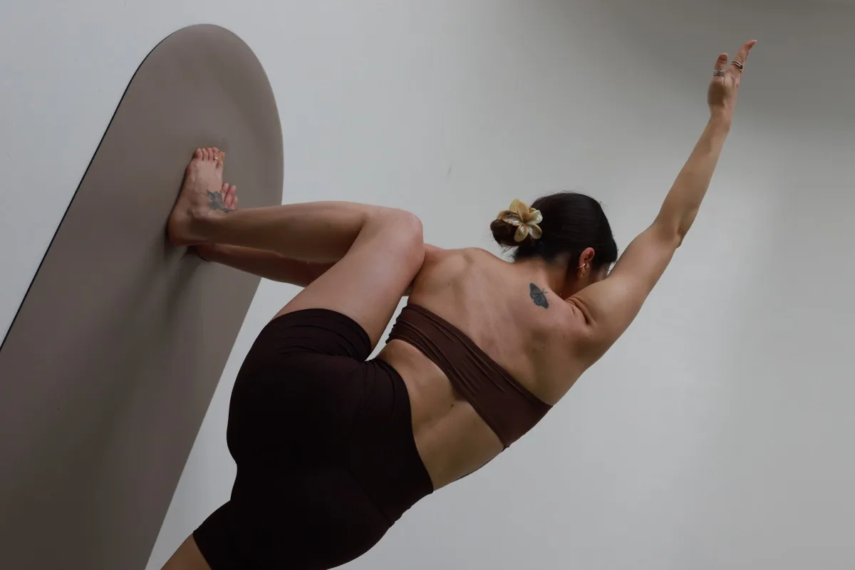 Marina — Utthita Parsvakonasana, Bronze & Bone, 2026
